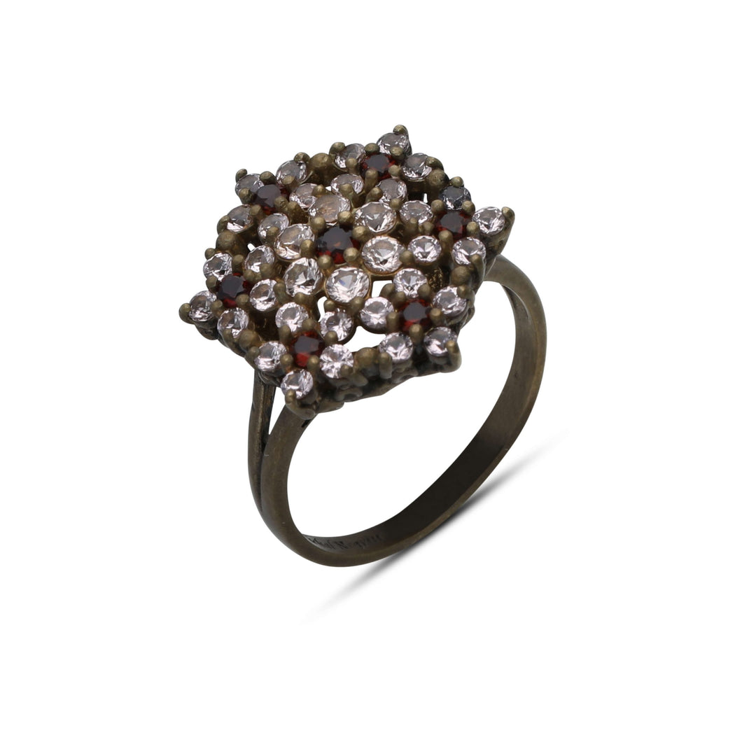Angel ring studded with cream garnet colored crystal stones