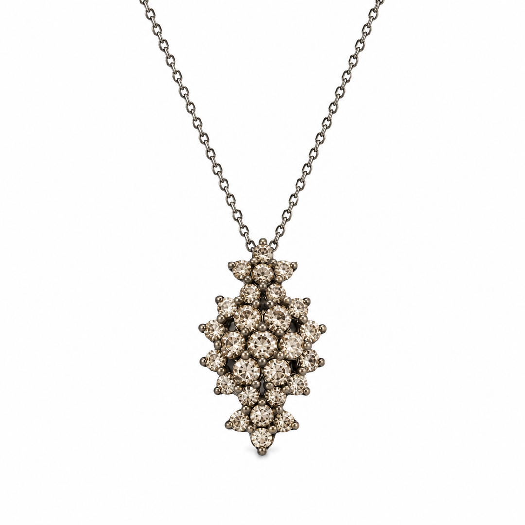 A floral rhombus necklace studded with cream  crystal stones