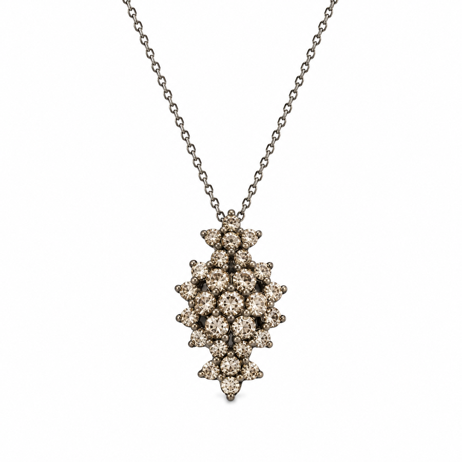 A floral rhombus necklace studded with cream  crystal stones