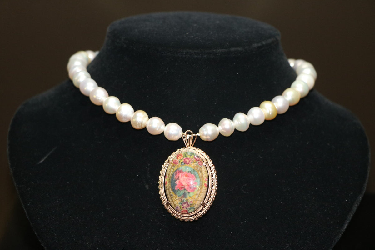 Pearl necklace with rose gold pendant inlaid with decal (the pendant is also a brooch)