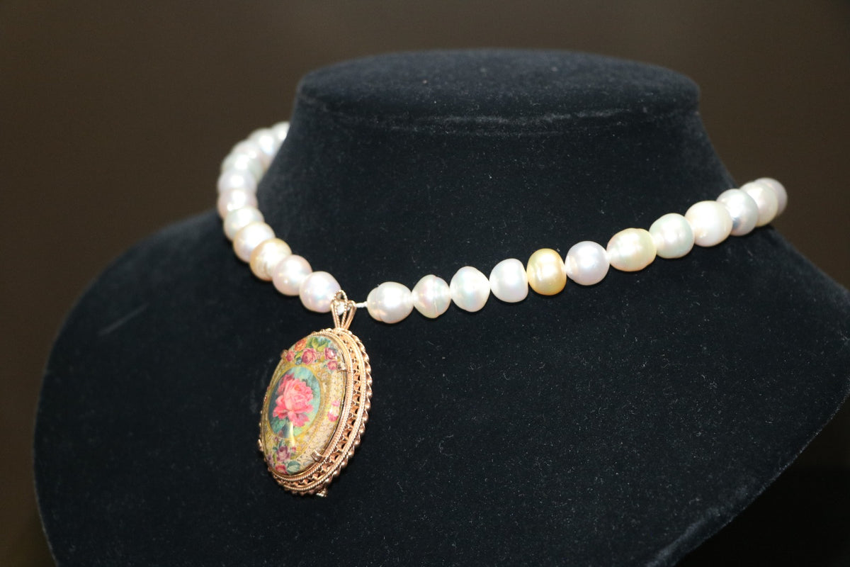 Pearl necklace with rose gold pendant inlaid with decal (the pendant is also a brooch)