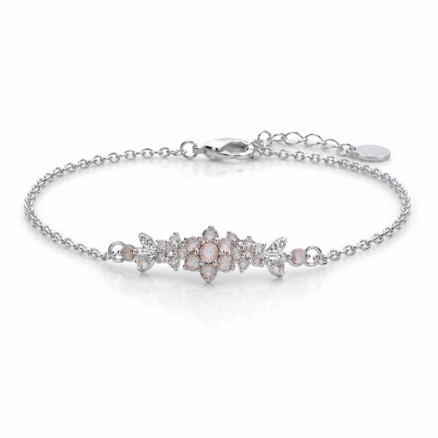 A medium flowering branch bracelet studded with champagne colored crystal stones
