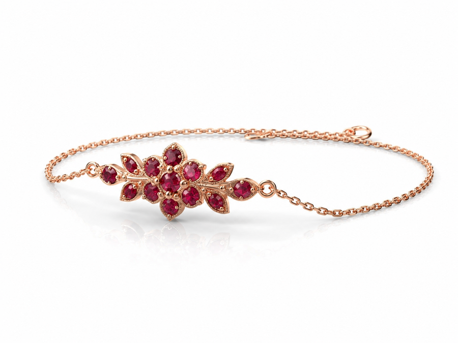 A short flowering branch bracelet studded with ruby colored crystals