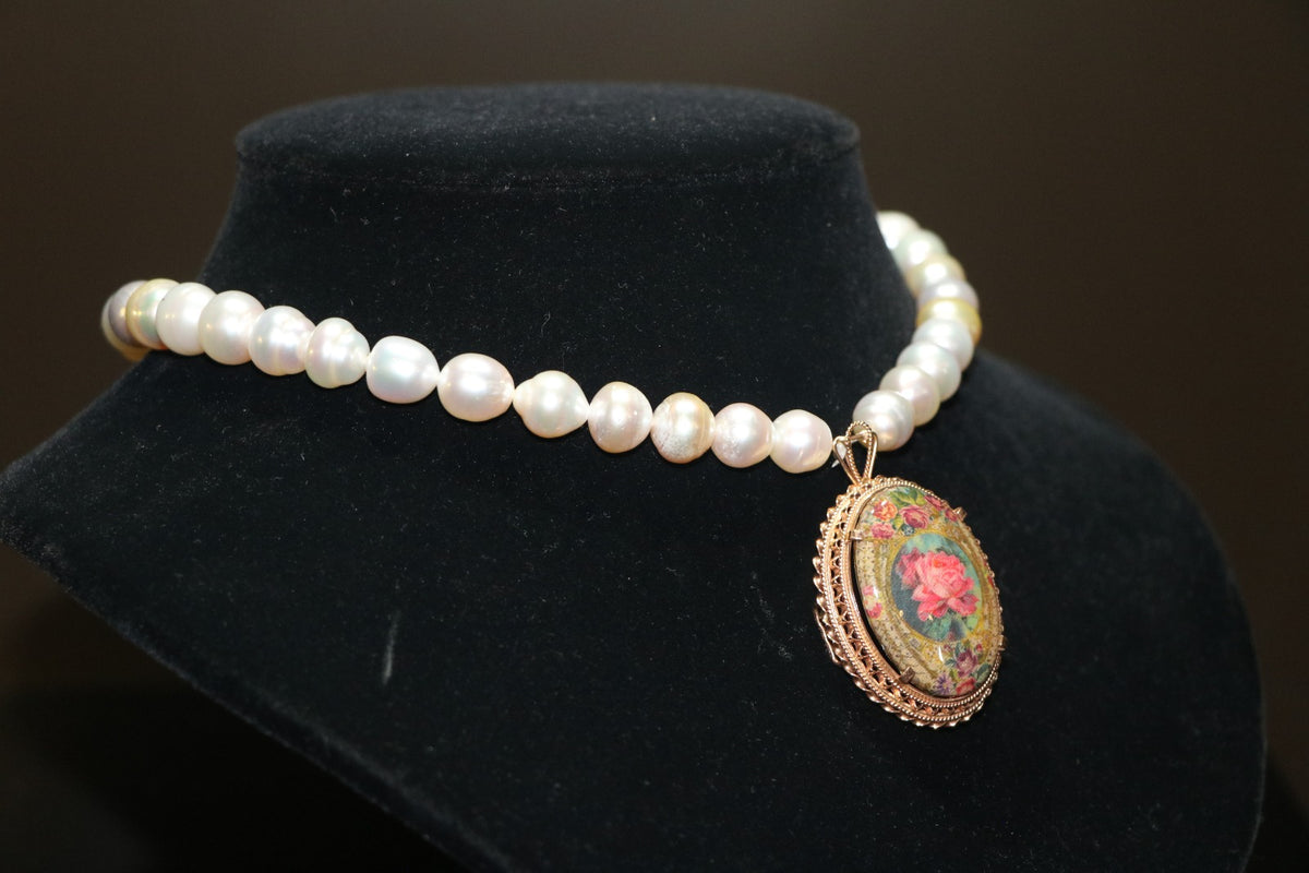 Pearl necklace with rose gold pendant inlaid with decal (the pendant is also a brooch)