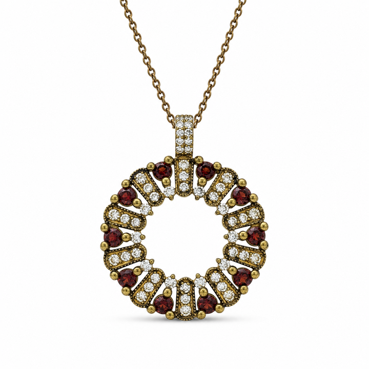 The circle of life necklace is studded with cream garnet colored crystals
