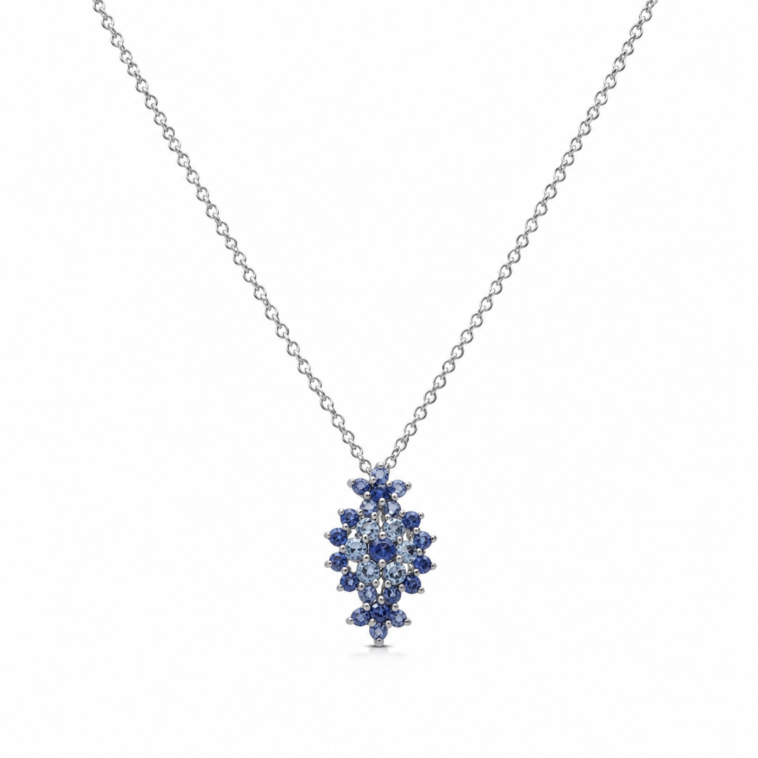 A floral rhombus necklace studded with blue crystal stones