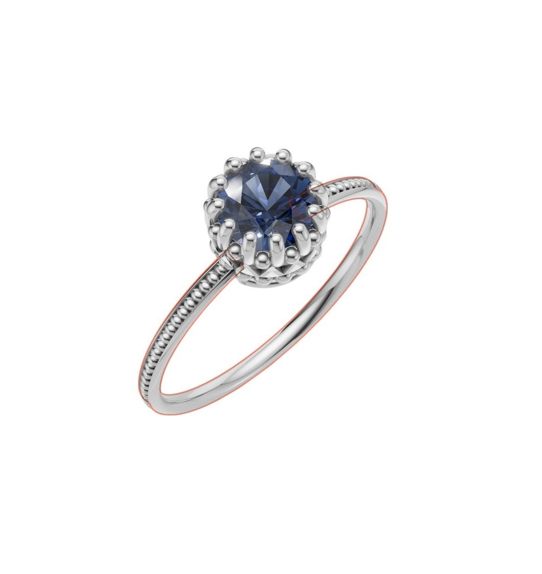 A gold ring with a sapphire
