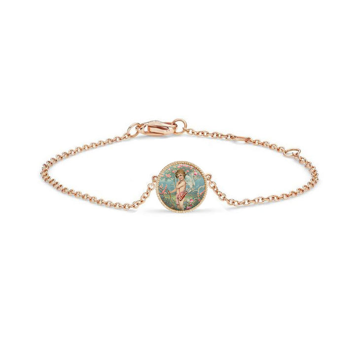 Gold bracelet with an angel holding a bow and arrow