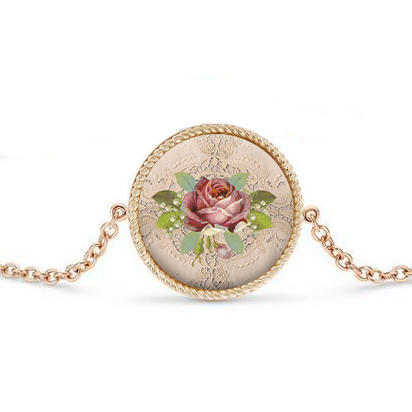 Gold bracelet with a pink rose