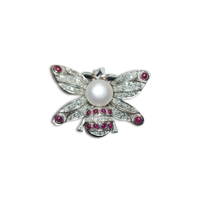 Gold butterfly brooch