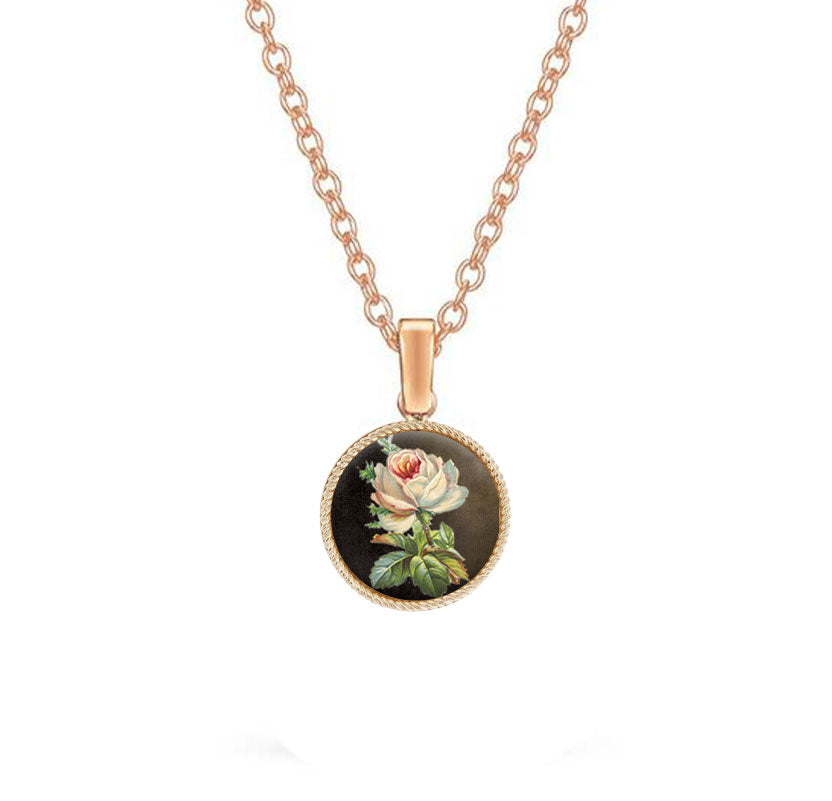 Rose gold pendant with a dark background